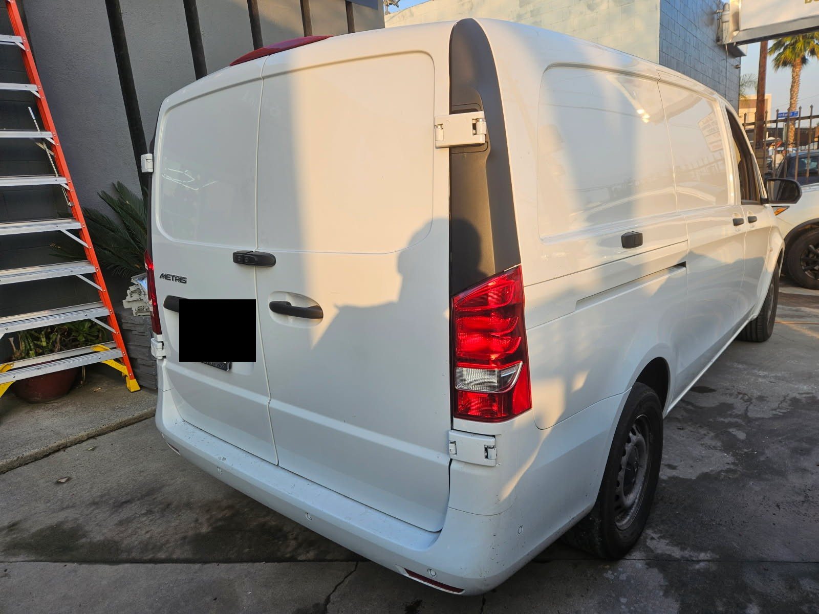 White commercial van after body repair at BG Auto Body